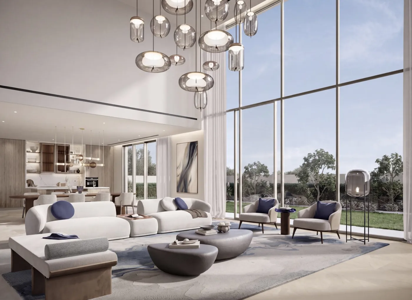 Double-height living room with sculpted glass pendants and garden glazing